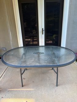 Glass & metal outdoor dining table