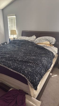 Bed with two night stand and a dresser