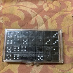 Vintage Tiny Dominos Complete Set Made by E. S. LOWE CO NEW YORK 7/8" sells on e bay for $35.00.