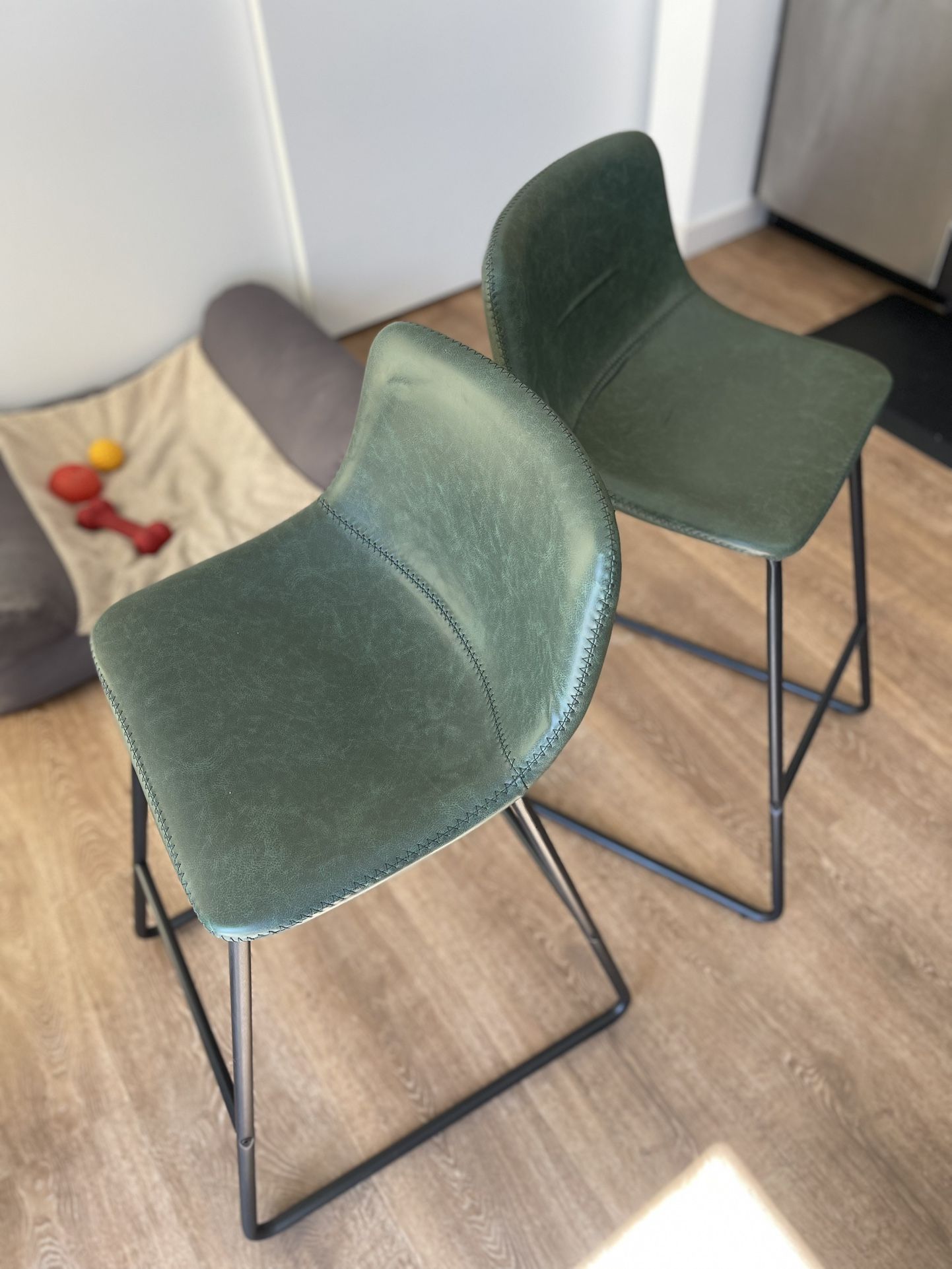 Green faux leather bar stool