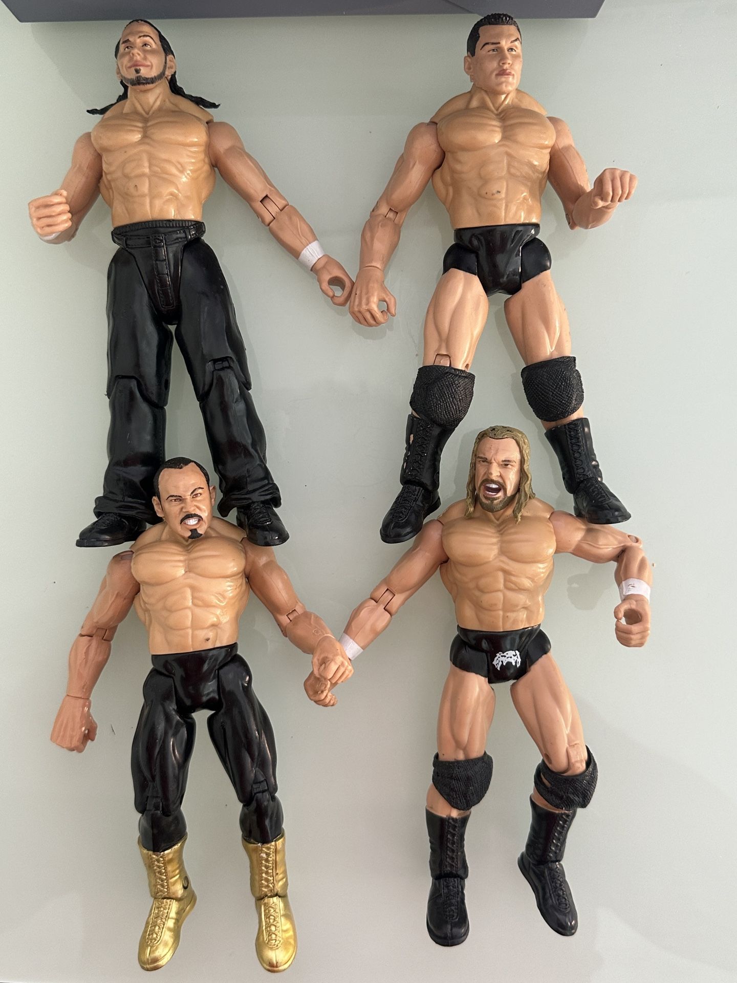 Lot of 4 WWE Jakks Pacific Wrestling Figures – Orton, Guerrero, Triple H, Hardy (1999