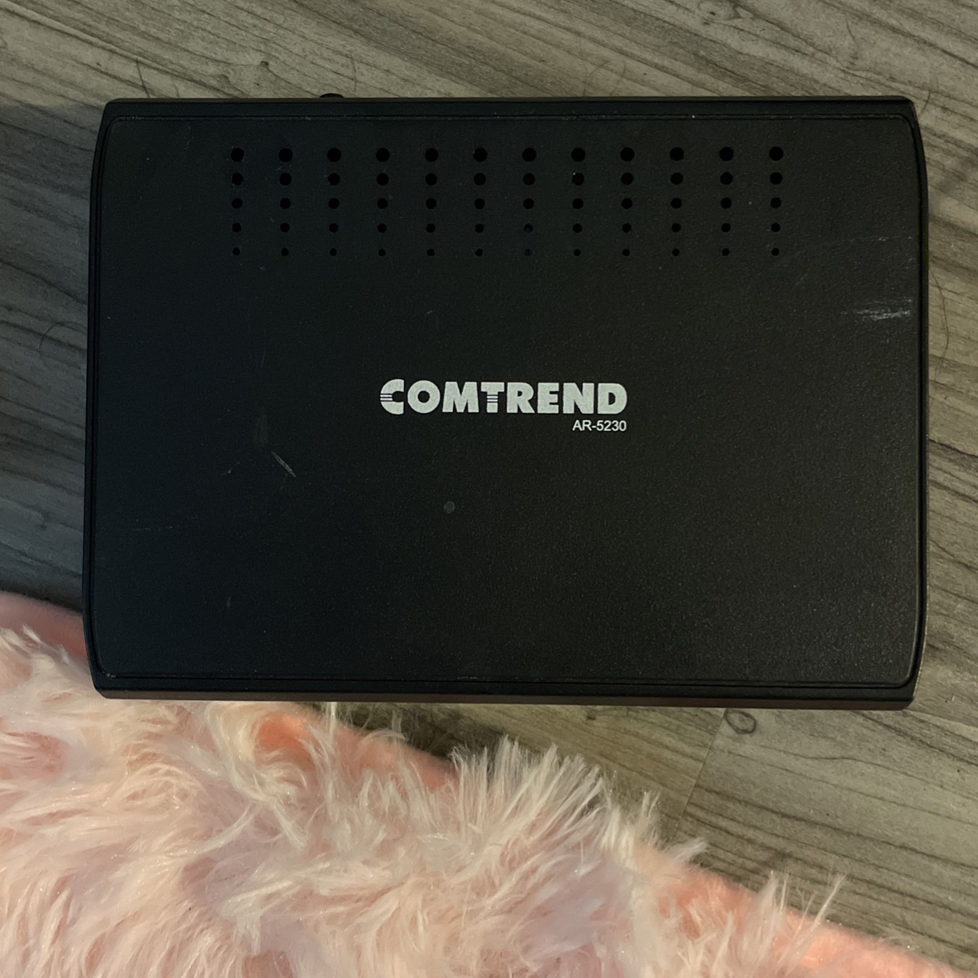 Comtrend ADSL2+ Router and Linksys workgroup switch