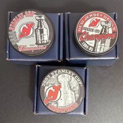 Three NEW in BOX New Jersey Devils Hockey Pucks $20 for All 