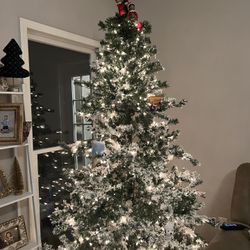 Flocked 7 1/2 Ft Artificial Pre Lit Tree