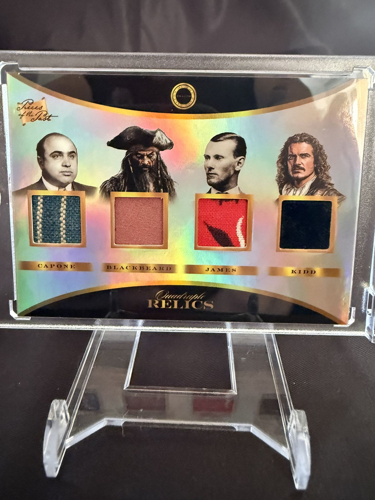 2025 Pieces of the Past Villains Edition Quad Relic featuring authentic material relics related to Al Capone, Blackbeard, Jesse James, and Captain Kid
