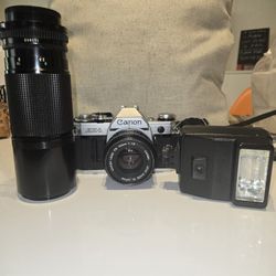 Vintage AE1 Canon Camera With Accessories 