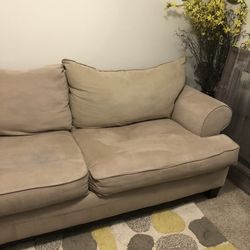 Tan Colored 4-6 seat Couch 
