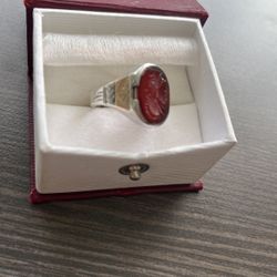 Beautiful antique sterling with 10K gold sides intaglio brown stone with figure head carved on top. 1915 to 1935 approx. size 8