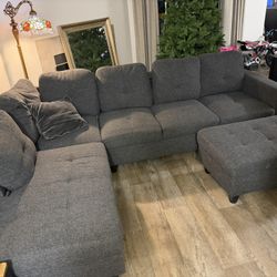 Dark Gray Linen Sectional Couch And Ottoman 