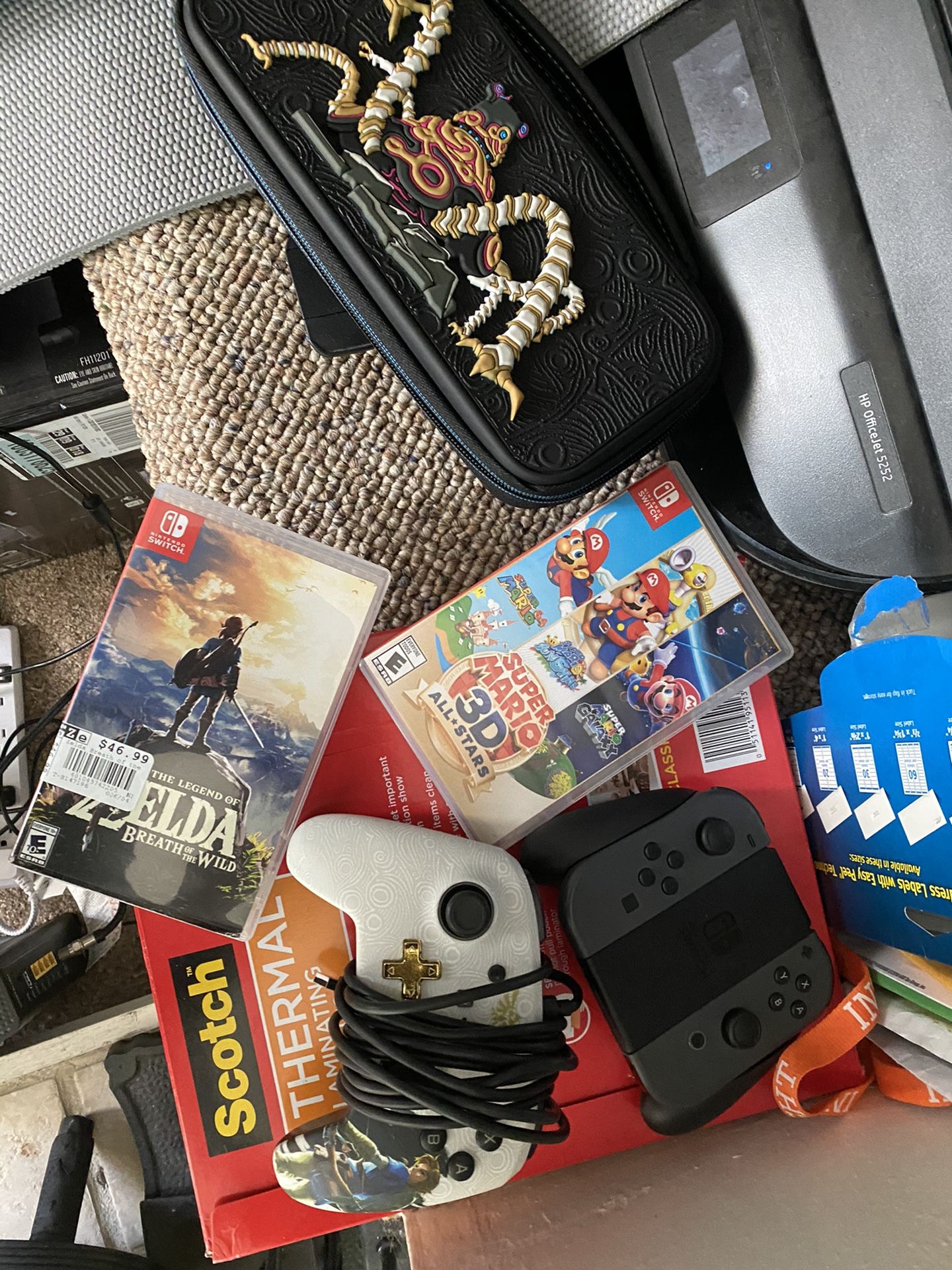 Nintendo Switch plus 2 controllers, 2 video games Zelda breath of the wild and Super Mario 3-D all stars collection. Comes with Zelda BOTW game case.