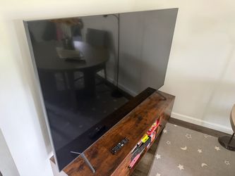 Large Flat Screen TV with Stand