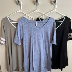 Set of 3 Women’s Size Large LuLaRoe knit stretch tunic shirts, excellent condition 