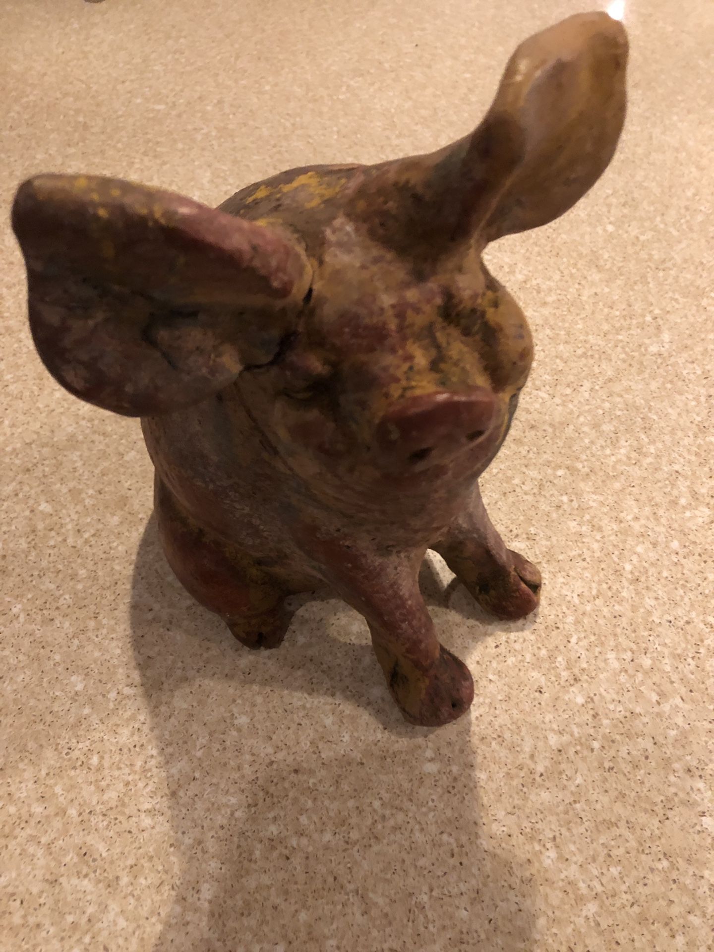 Clay garden pig statue