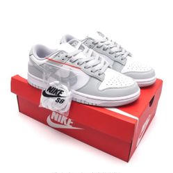 A pair of grayish-white shoes