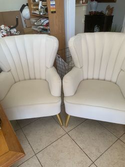 Two velet accent chairs