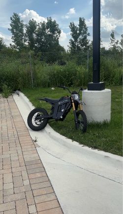 tuttio W/ 60v 34ah surron batt