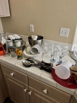 Plates, cups, wine glasses and kitchen things