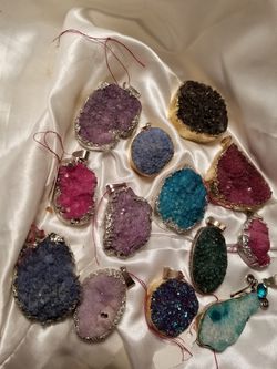 Druzy quartz pendants wrapped in silver or gold leaf, $9 each