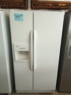 Kenmore Side by Side Refrigerator White excellent . Warranty . Delivery available . 2203 Fowler st. Ft. Myers 33901
