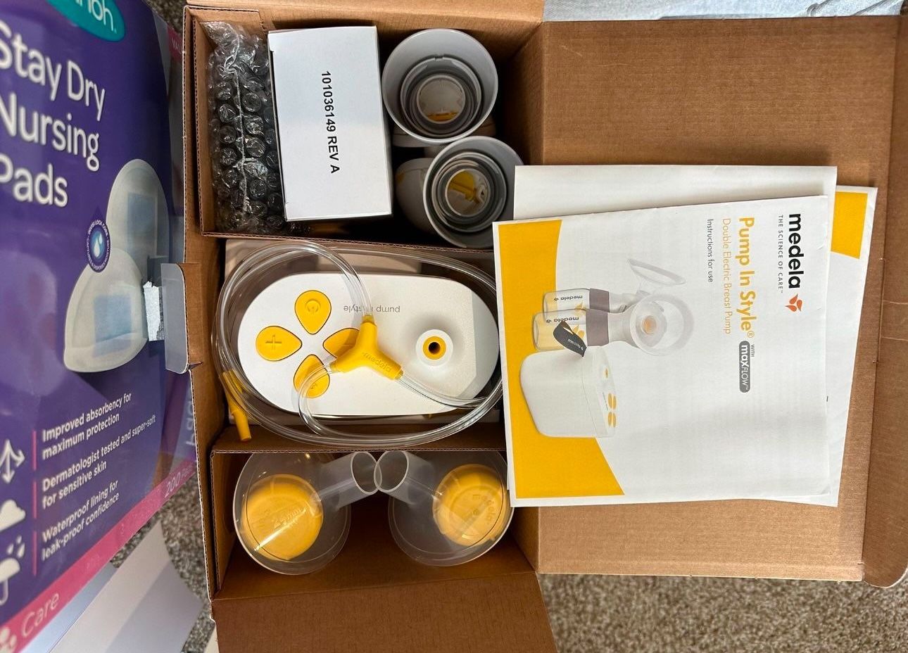 Breast Pump, medela + Stay Dry Nursing Pads (200+)