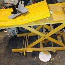 2 Yellow Motorcycle Lifts