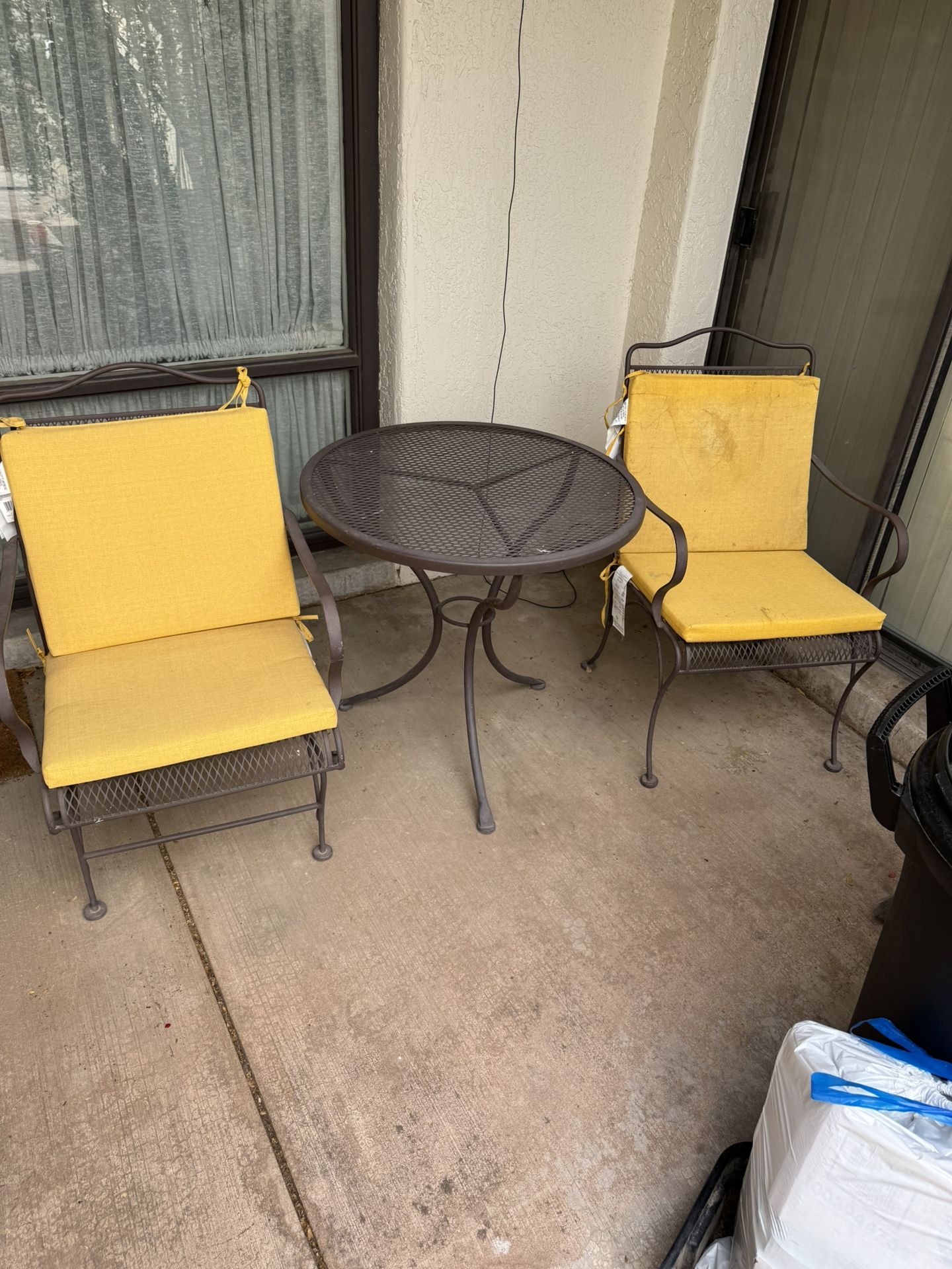 Patio Furniture with an extra set of cushions.