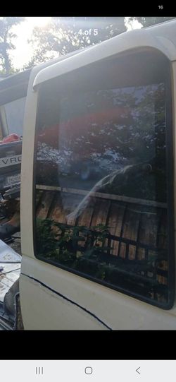 2 Back side windows for a 95 GMC Sierra