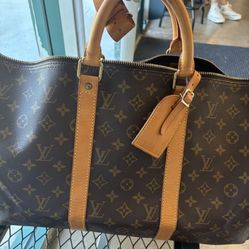 Louis Vuitton Tracking Duffle Bag 