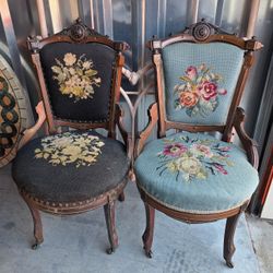 Victorian-era antique Side chairs with intricate wood carvings and floral needlepoint