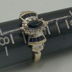 14kt white gold ladies fashion ring with blue stones and diamonds 0.15 carat total weight 2.7 gr size 7. 843184-4. Pre owned 