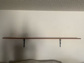 2 wooden hanging wall shelves