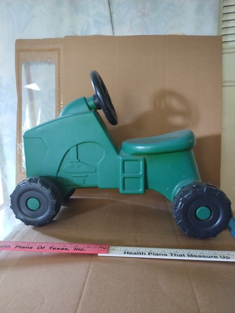 John Deere Sit and Scoot Tractor.... Marbach and 410 at 78227 or 1604