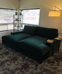 Joybird daybed style green velvet sofa.
