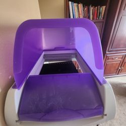 Self Scooping Litter Box