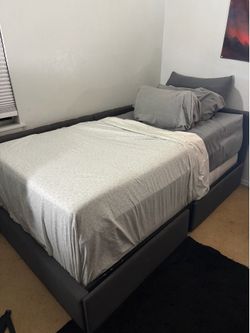 Twin bed with mattresses