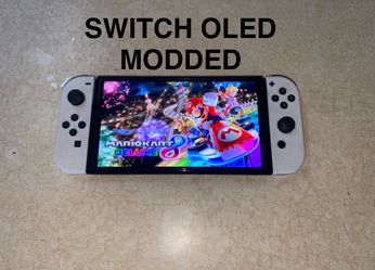 NINTENDO SWITCH OLED + 7500 GAMES INCLUDED