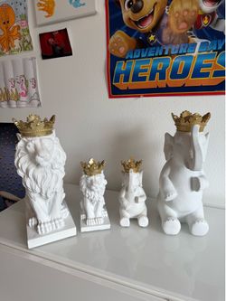Lion and Elephant figurines