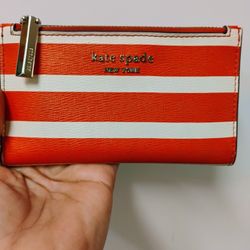 Kate Spade Spencer Small Slim Bifold Wallet in Striped Tamarillo