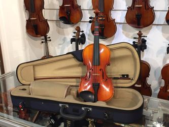 Used 1/4 size Suzuki violin