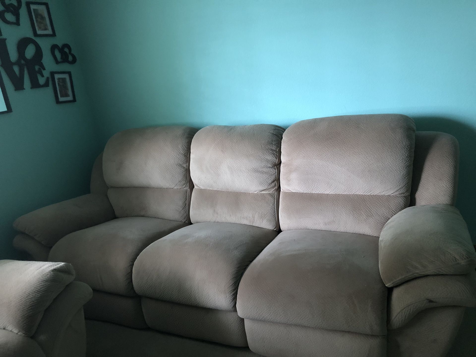 Recliner sofa and love seat for sale.