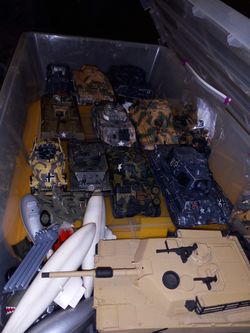 Military Tanks, Armored Personnel Vehicles, also Soldiers, and Equipment , And Munitions.  21st Century Toys,   some  are motorized.  