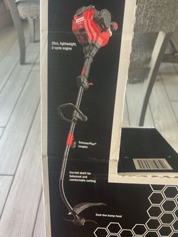 Brand New Troy Bilt TB22 curved shaft gas trimmer 25CC converts to multiple tools with trimmer plus attachments New in box never been opened.