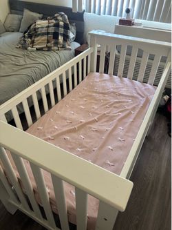 White wooden crib