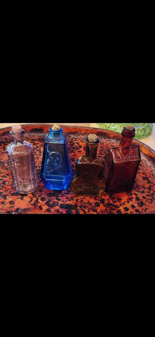 Vintage miniature colored bottles
