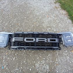 2021,2022,2023 FORD F150 RAPTOR SET OF HEADLIGHTS, GRILL AND SHUTTER 