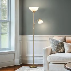 Torchiere Floor Lamp with adjustable reading light. Color, brass