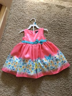 Brand new adorable dress w/matching panties. Size 24 months.