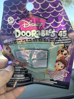 New in package Disney Doorables price is for each one I have 15 available
