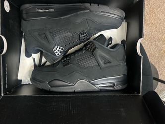 Black cat Jordan 4s