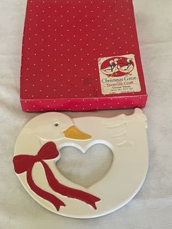 Vintage 1980s Treasure Craft ceramic Christmas goose trivet in its original box.